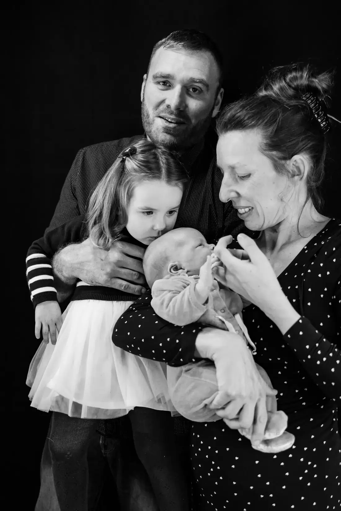 Famille avec nouveau-né et aîné